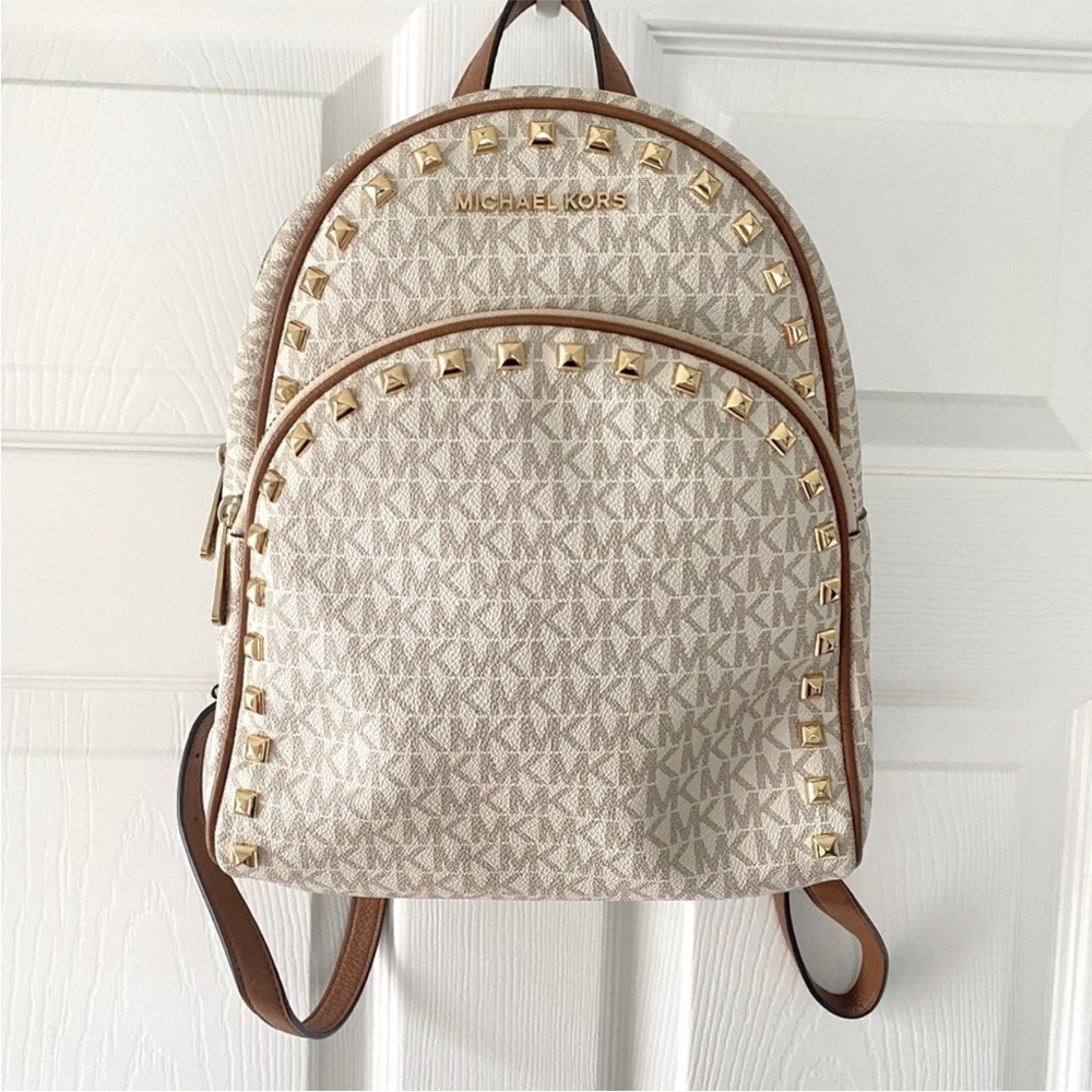 Michael Kors Cream Logo Backpack with Brown Trim and Gold Studs